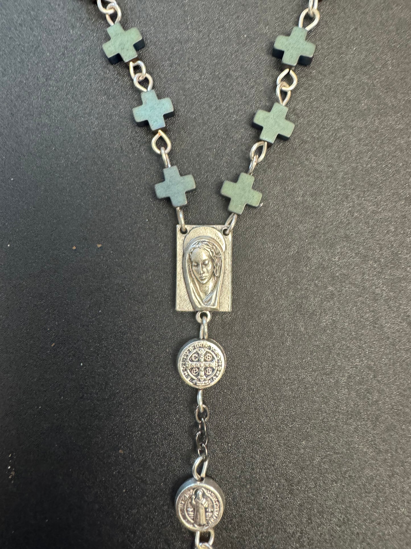 Square centerpiece with picture of mary on full size rosary with frosted hematite cross beads and st. Benedict medal beads