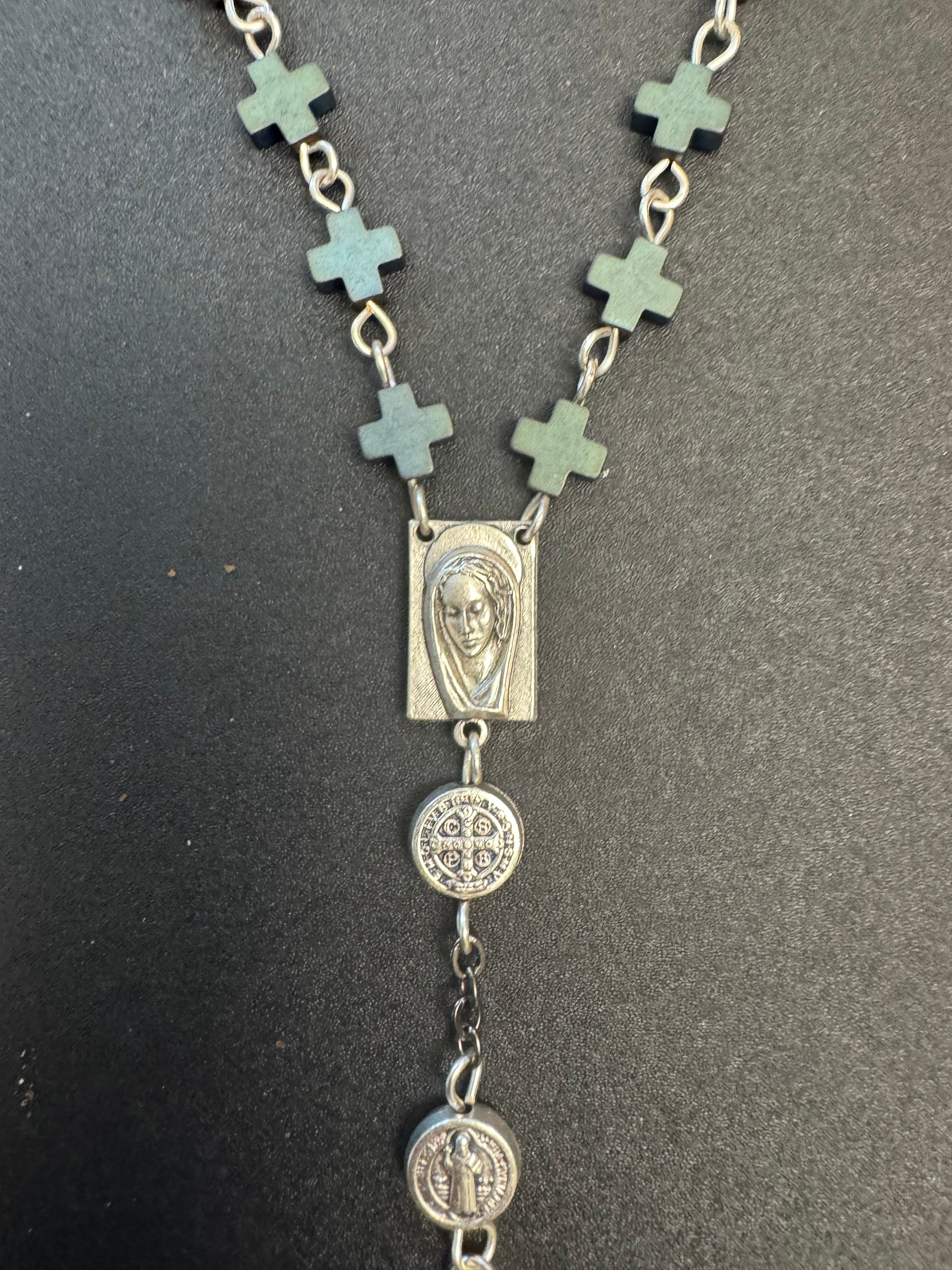 Square centerpiece with picture of mary on full size rosary with frosted hematite cross beads and st. Benedict medal beads