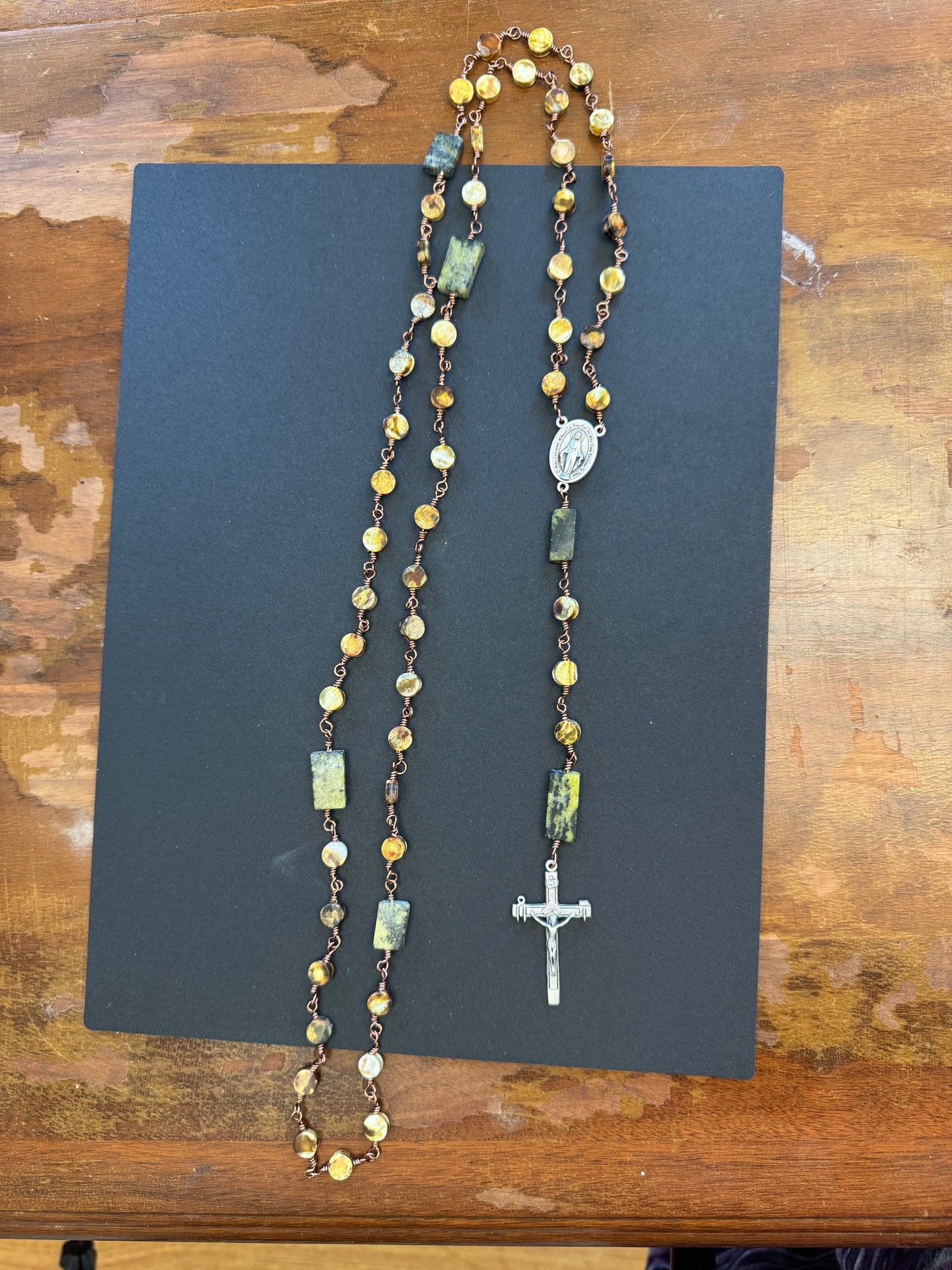 Zoomed out perspective of Flat jasper and serpentine bead full size rosary