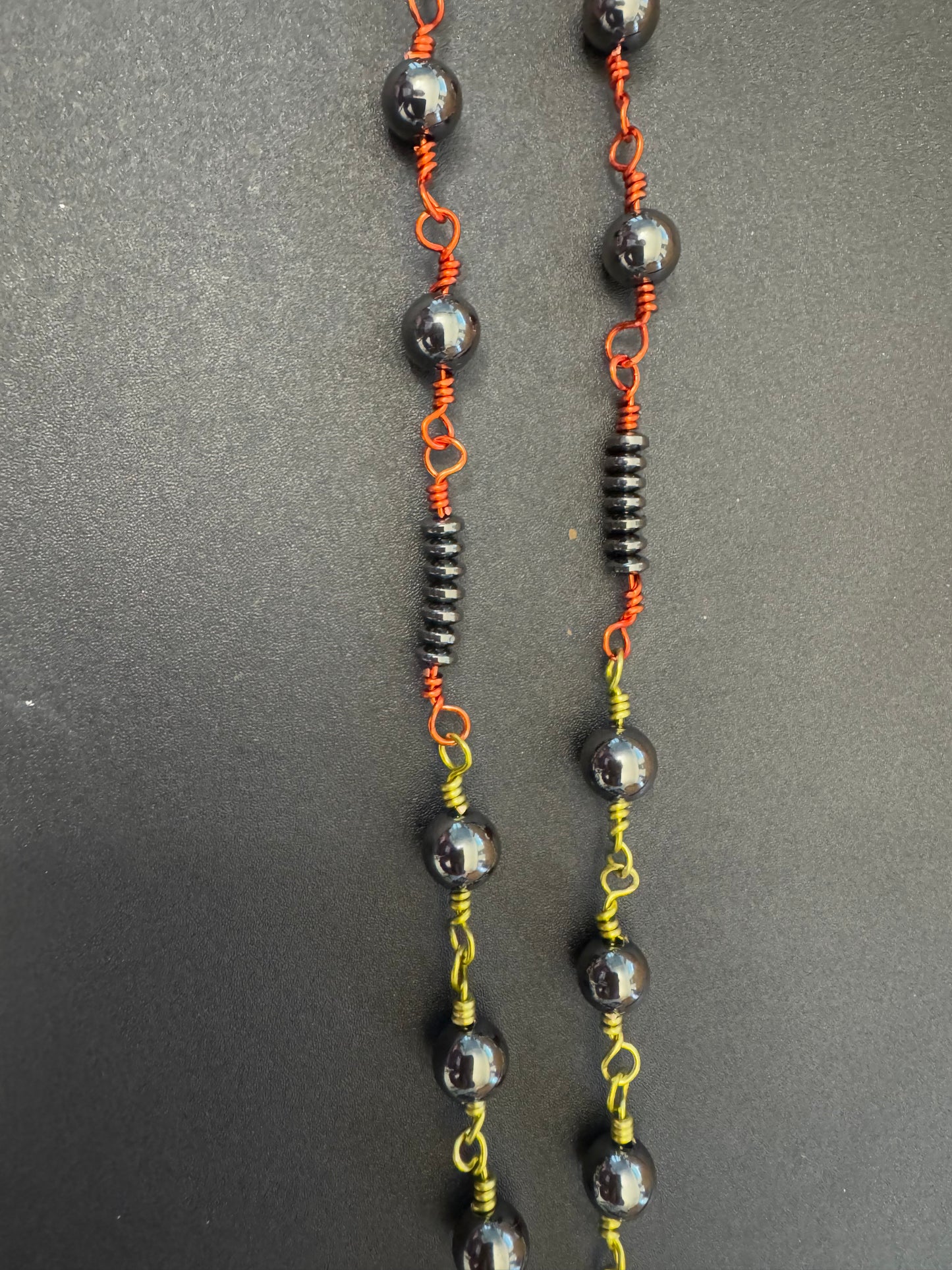 closeup view of multicolored wire on St. Anthony chaplet