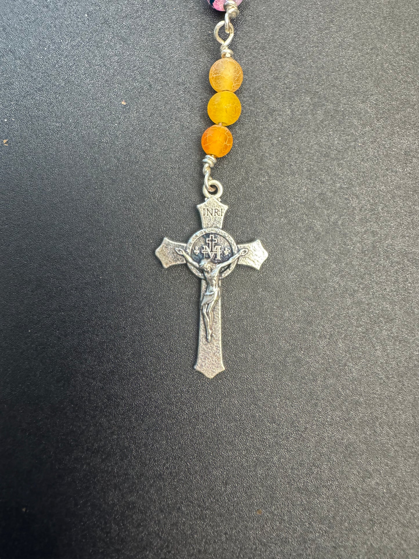Crucifix on full size rosary with multicolored glass and orange agate beads