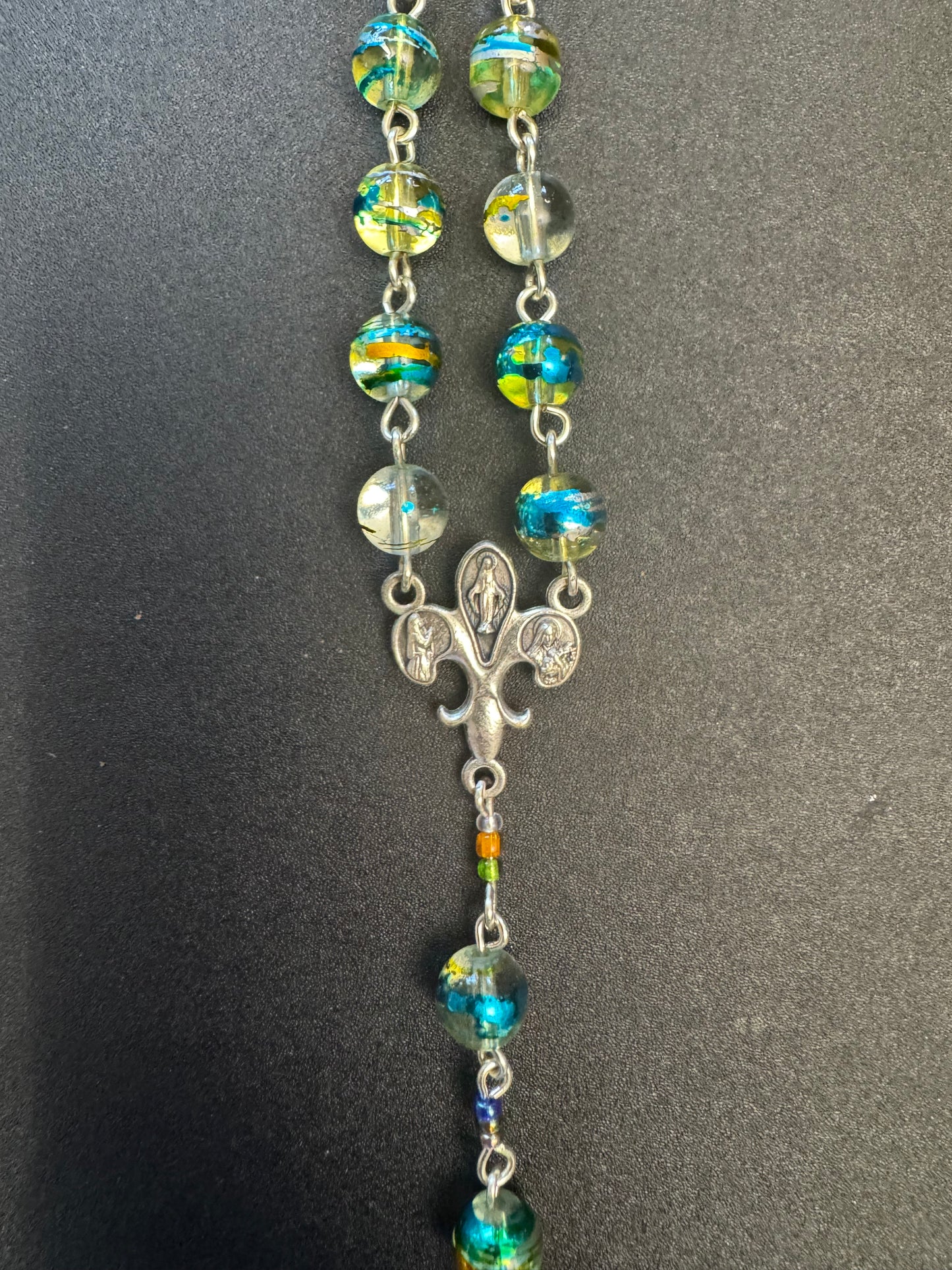 fleur de lis centerpiece On Blue and green swirl glass bead rosary with crown of thorns crucifix