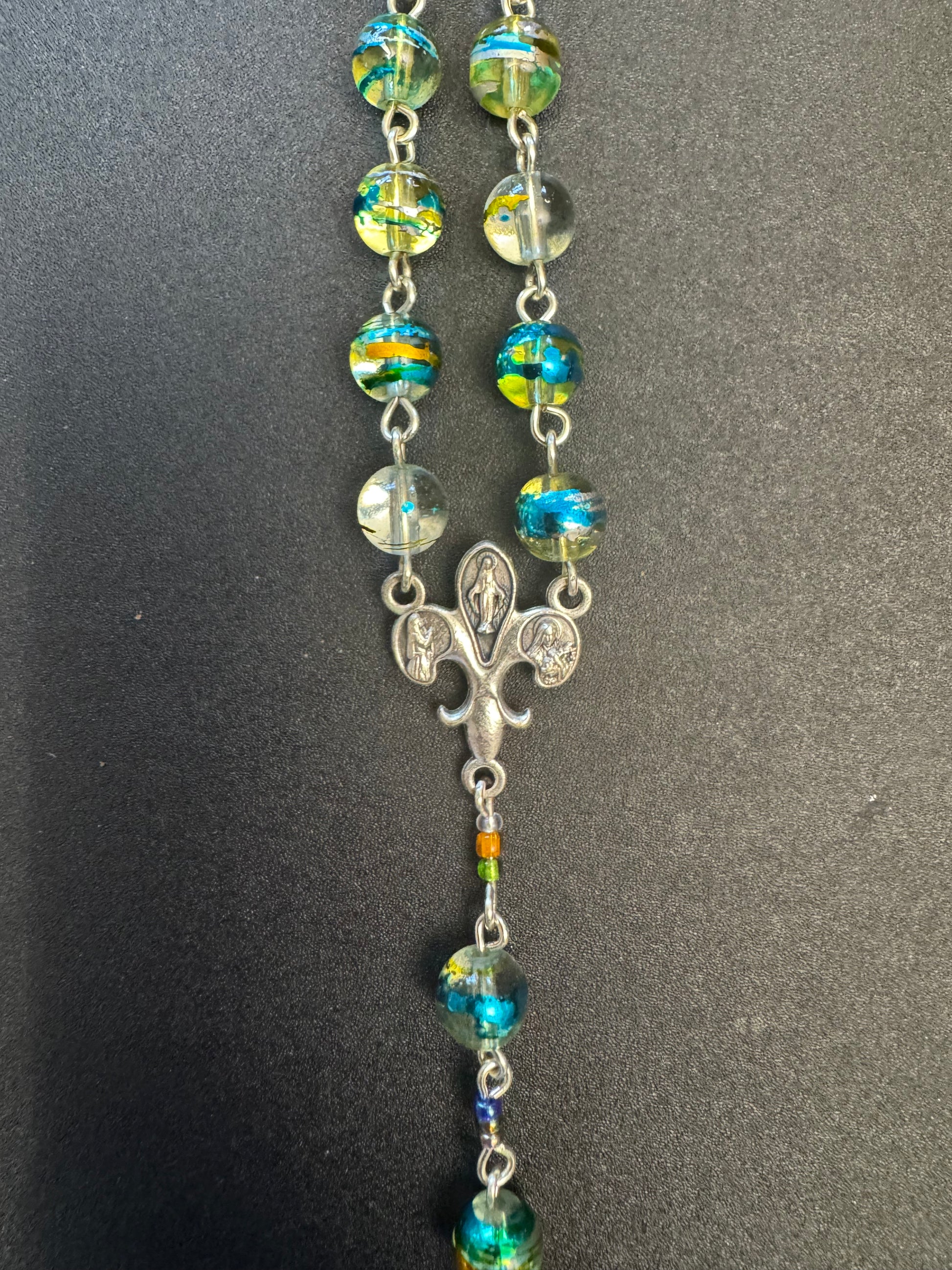 fleur de lis centerpiece On Blue and green swirl glass bead rosary with crown of thorns crucifix