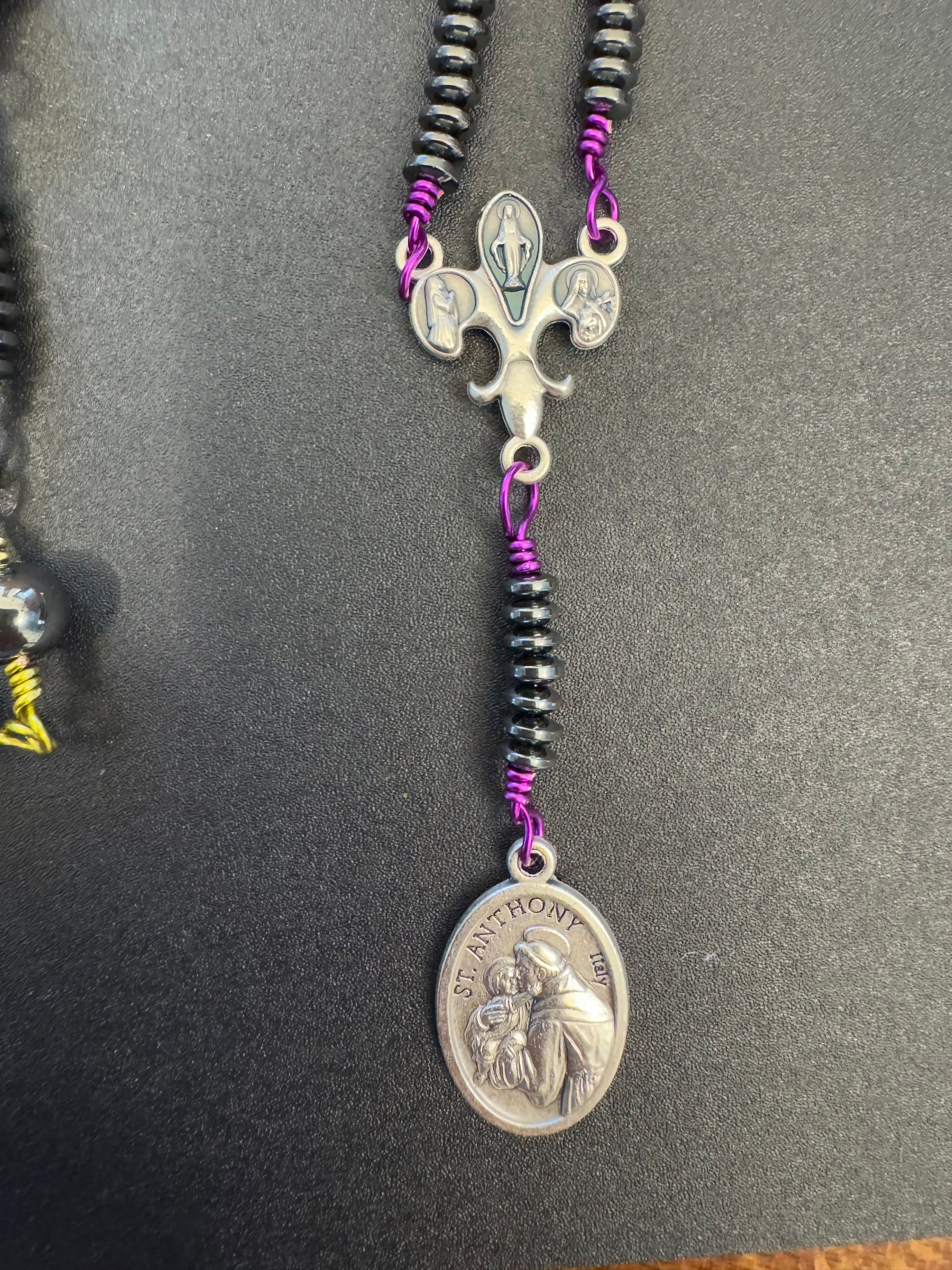 closeup view of St. Anthony medal and leur-de-lis centerpiece on St. Anthony chaplet