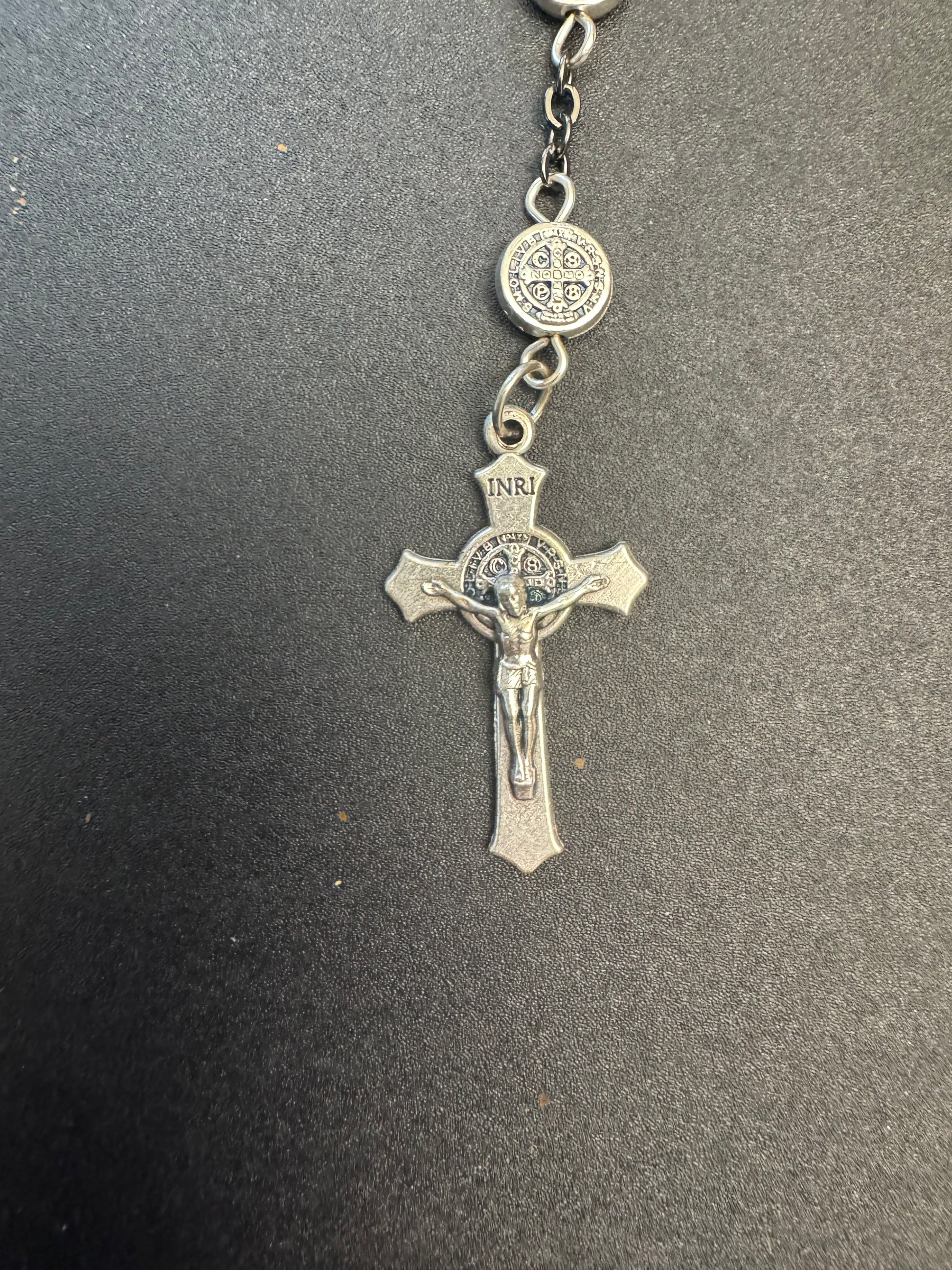 Crucifix on full size rosary with frosted hematite cross beads and st. Benedict medal beads