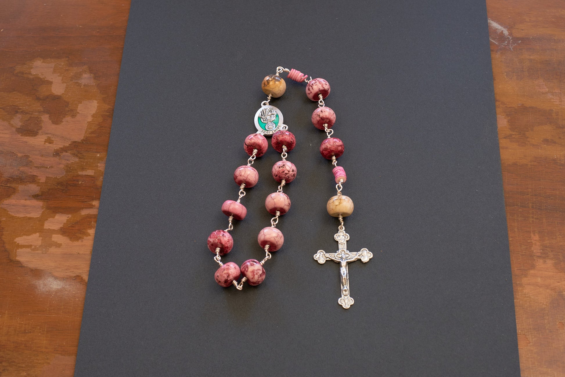 St. Jude Single Decade Rosary With pink stone beads and green accented centerpiece 